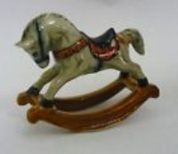 PORCELAIN ROCKING HORSE