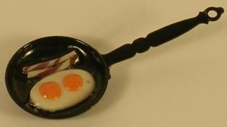 FRIED EGGS IN FRY PAN