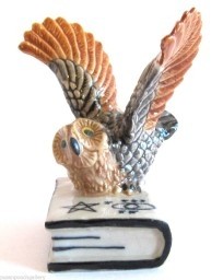 BIRD-OWL ON A BOOK